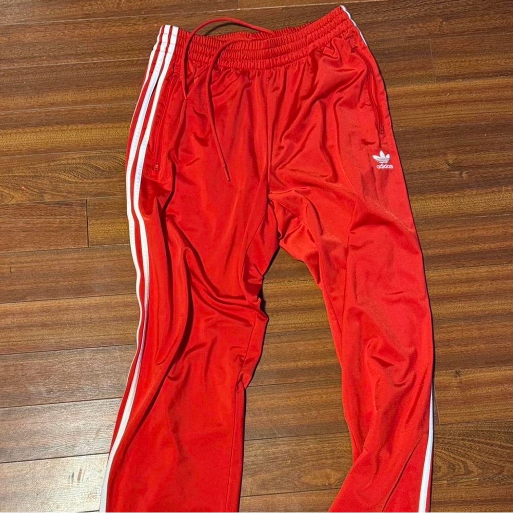 Adidas 3 stripe red track pants men’s Size Large. Zipper pockets